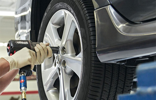 A tire being replaced at a shop for auto repair in Safety Harbor